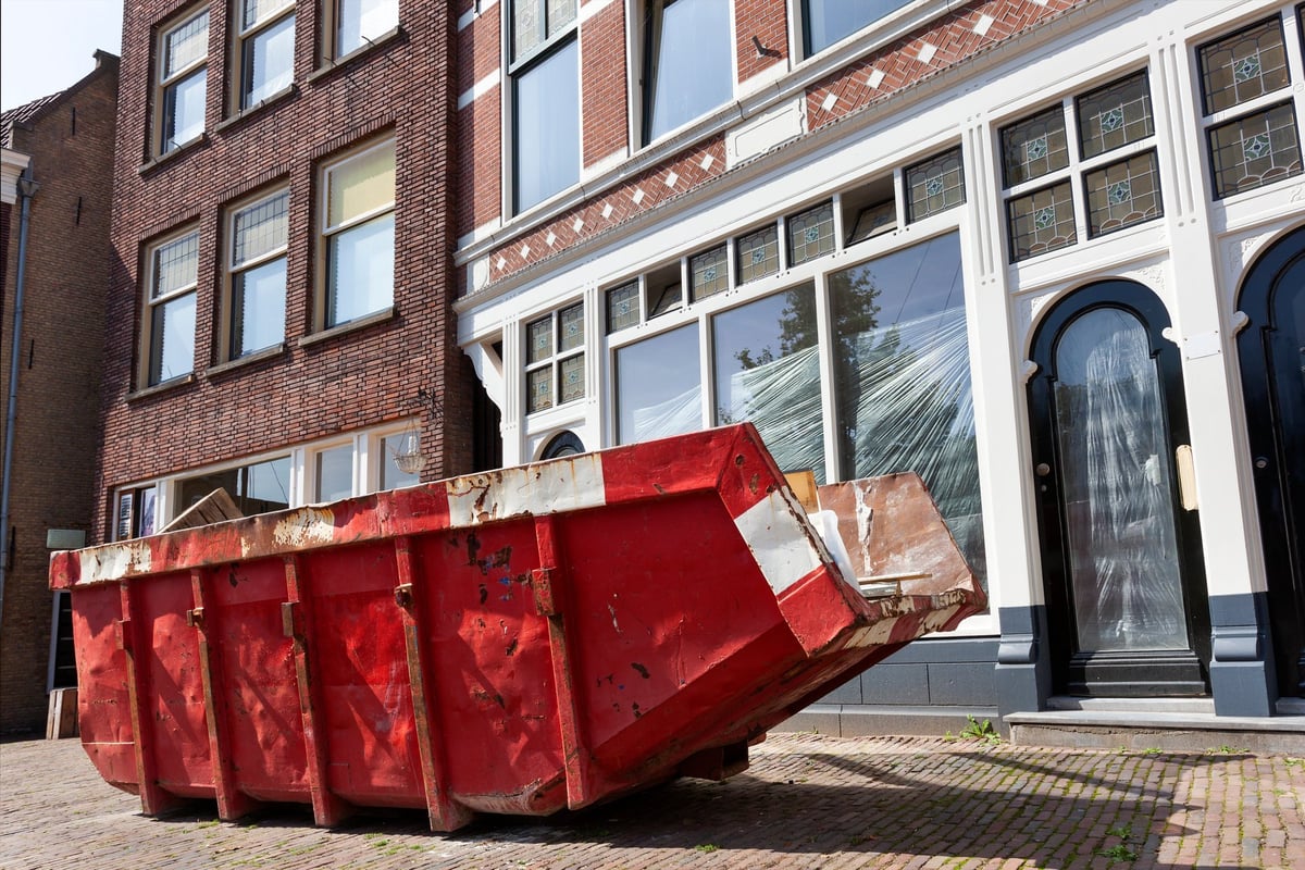 G.I. Junk Joes crew dumpster on the job — veteran-owned junk removal in action